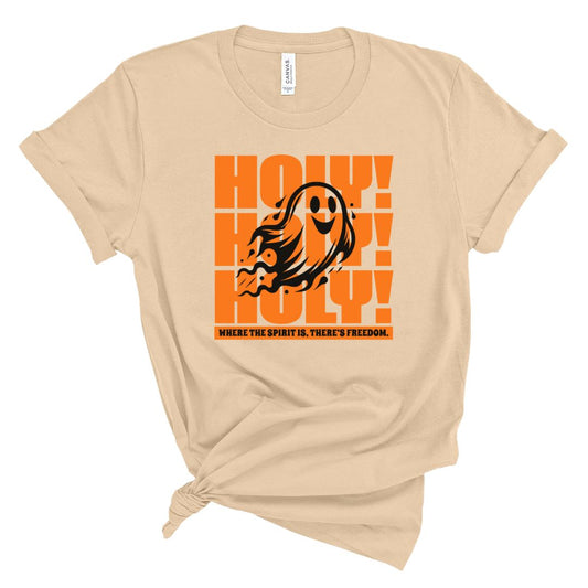 Beige Holy Ghost Halloween t-shirt with orange and black graphic design on a whitebackground