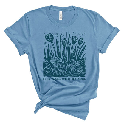 Christian t shirt for women with teal floral block print design and the words It Is Well With My Soul in vintage style lettering.