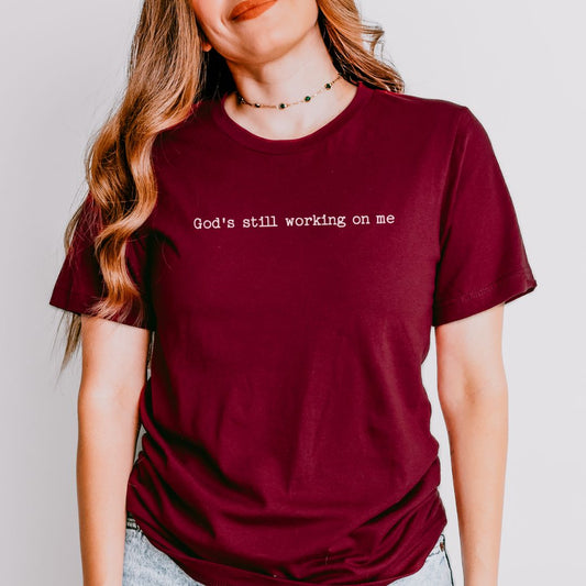 God’s Still Working on Me Tee