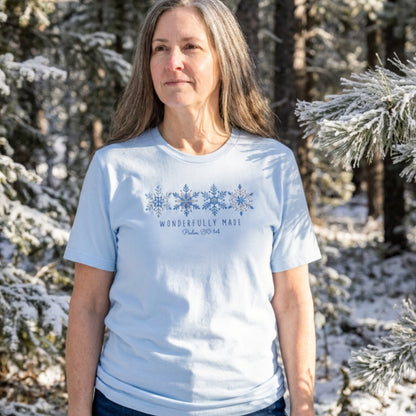 Christian tee with four detailed snowflakes in a blue printed faux embroidery style, with Wonderfully Made and Psalm 139:14 underneath.