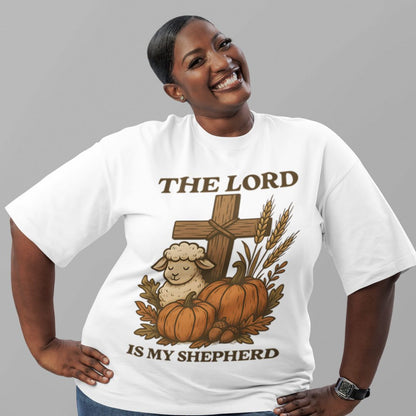 Woman wearing a white t-shirt with religious design and text on a gray background