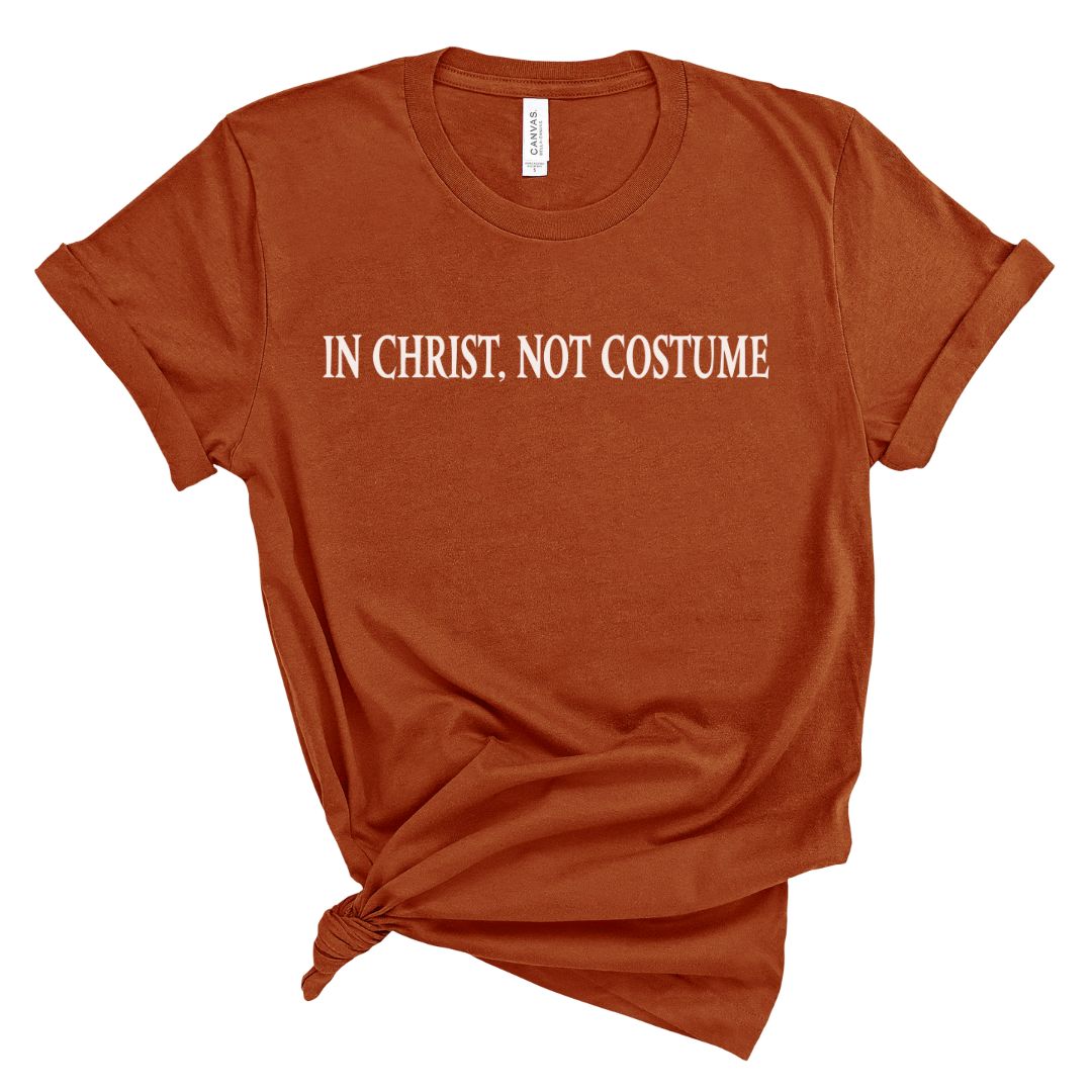 t-shirt with 'IN CHRIST. NOT COSTUME' text 