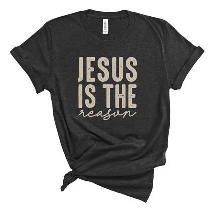 Black t-shirt with 'Jesus is the reason' text on a white background