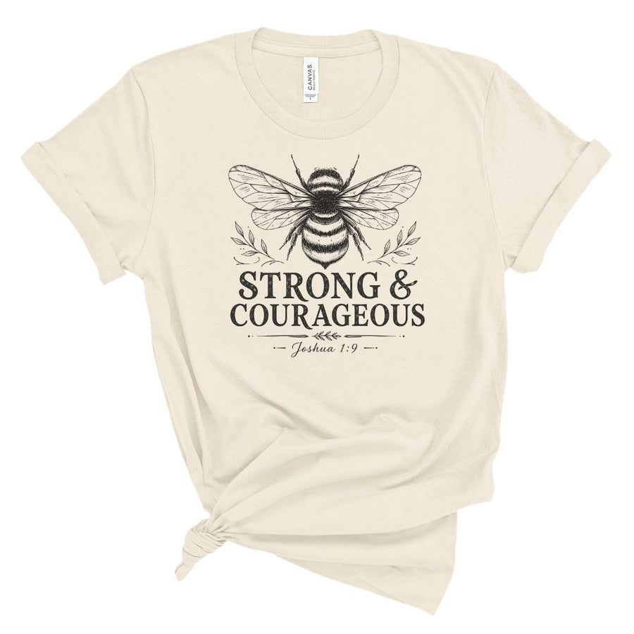 Christian t shirt featuring a vintage bee illustration and the words Strong & Courageous with Joshua 1:9. Faith based shirt for women inspired by the Bible verse about courage and God's presence.