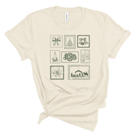 Beige t-shirt with Christian Christmas-themed graphics that look like vintage stamps 
