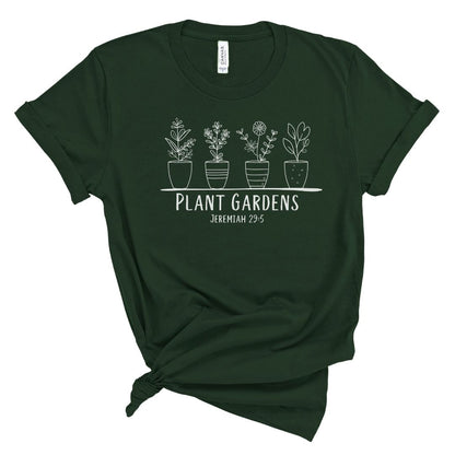 Christian t shirt for women with line art potted plants and the words Plant Gardens Jeremiah 29:5, faith based botanical Bible verse shirt
