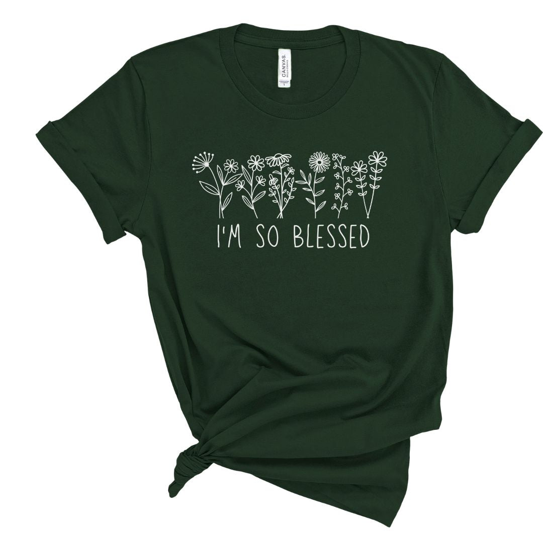 Dark green t-shirt with floral design and 'I'm so blessed' text on a white background