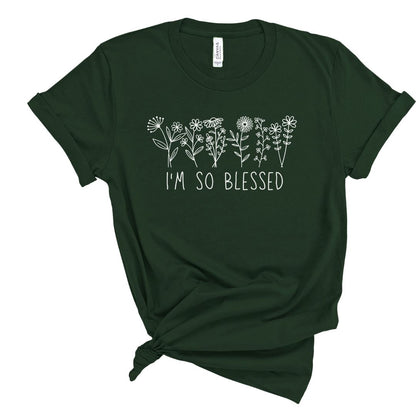 Dark green t-shirt with floral design and 'I'm so blessed' text on a white background