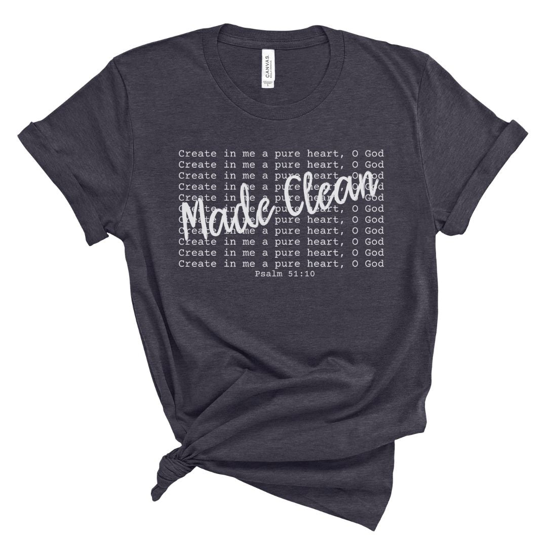 Black Christian women’s t-shirt featuring the phrase “Made Clean” in white script over repeated Psalm 51:10 text. Minimalist scripture tee with a flattering, everyday fit.
