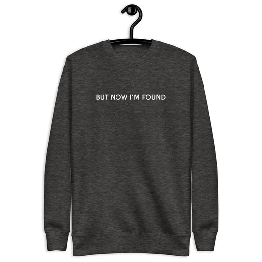 sweatshirt with the text But now I'm found in a simple minimalistic font