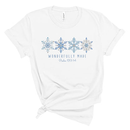Christian tee with four detailed snowflakes in a blue printed faux embroidery style, with Wonderfully Made and Psalm 139:14 underneath.
